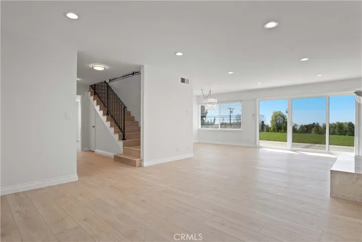 Living Room and Dining Area look out towards the ocean.