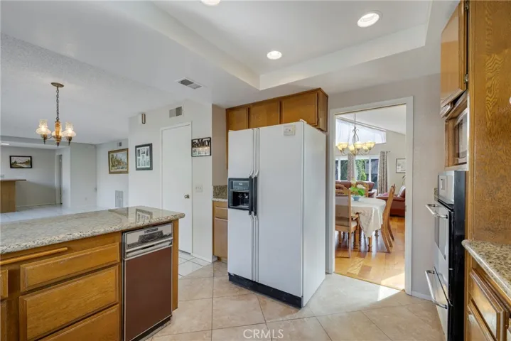 Kitchen opens to Family Room, Breakfast Nook and Formal Dining Room