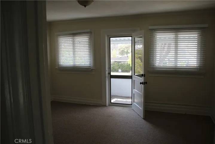 Living room with access to the balcony.