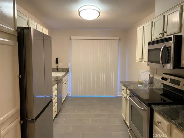 Large kitchen with a breakfast table area