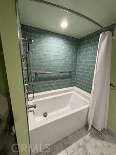 Beautiful glass tile shower surround