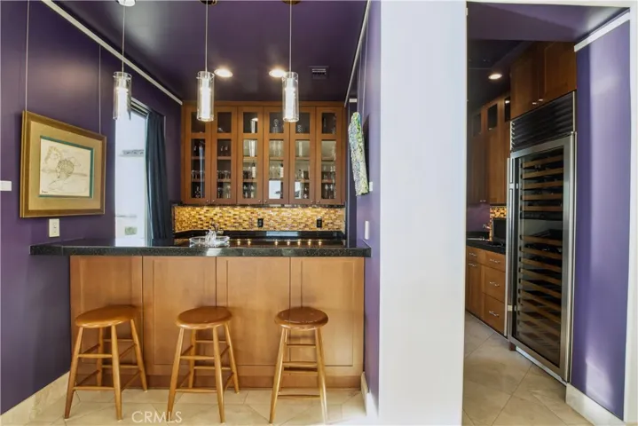 Fantastic bar with Sub Zero wine storage, dedicated ice maker, and Fridge