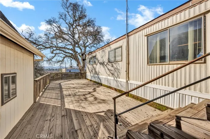 Large deck between house and garage