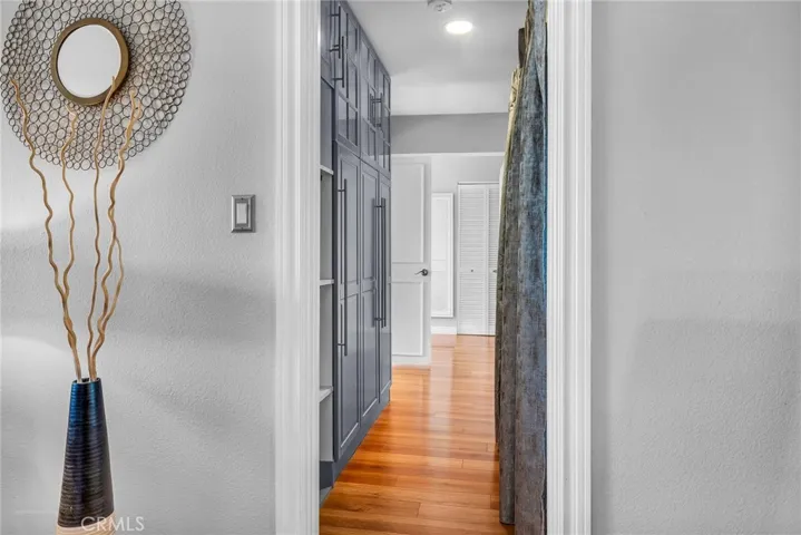 cabinets on one side, laundry closet on the other side