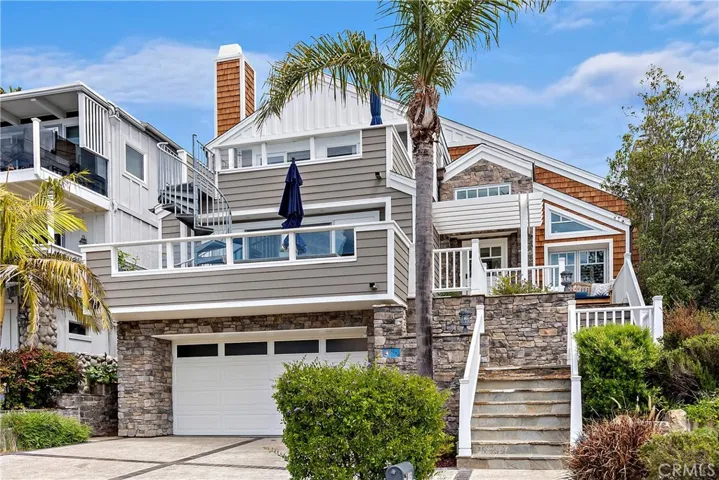 Stunning stone work and mature landscaping adds to the curb appeal.