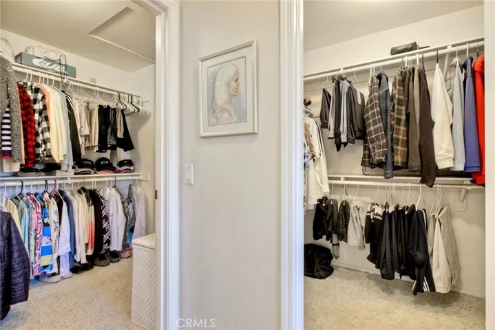Two closets in primary bedroom