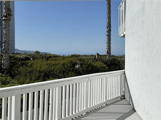 Balcony entrance from the living room and bedroom.