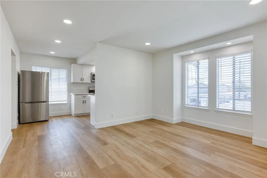 Living Room 2 with Brand New Window Covering throughout