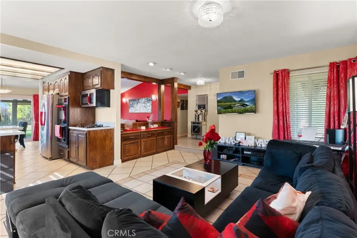 photo of current living room looking into kitchen