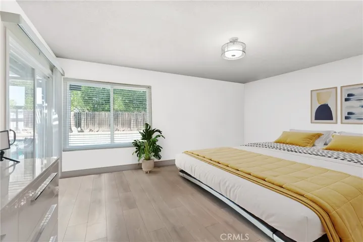 virtually staged master bedroom as example