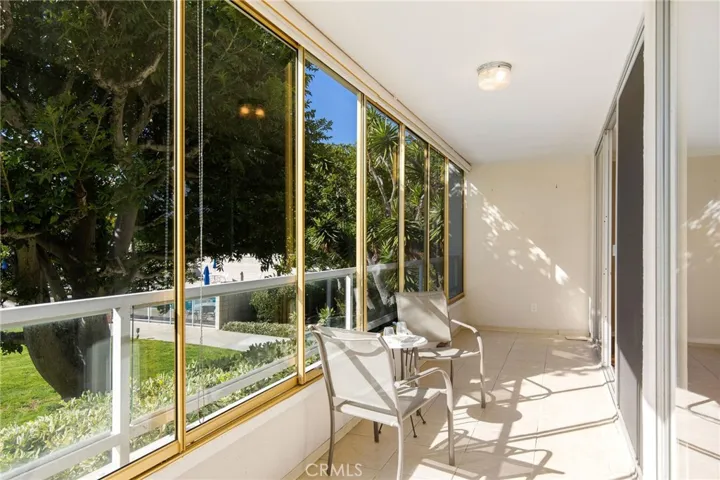 open-air balcony with slide windows