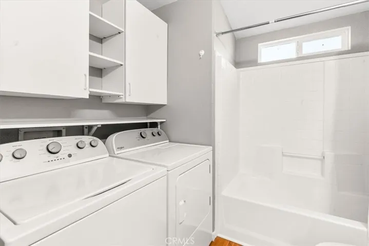 Laundry Area
A dedicated laundry space featuring a washer and dryer for ultimate convenience. Thoughtfully designed to maximize efficiency while blending seamlessly into the home’s layout. Cabinets for storage