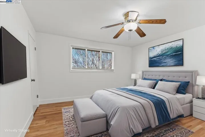 Upstairs bedroom that has be virtual staged