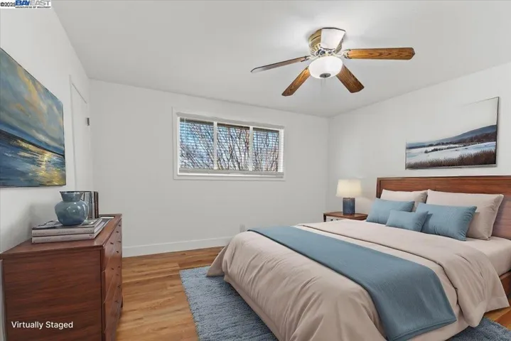 Upstairs bedroom that has be virtual staged