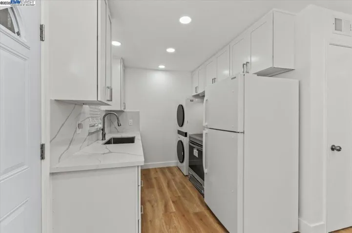 Fully Remodeled with all new cabinets, Quarts Counter top, Stainless sink, All new appliances.