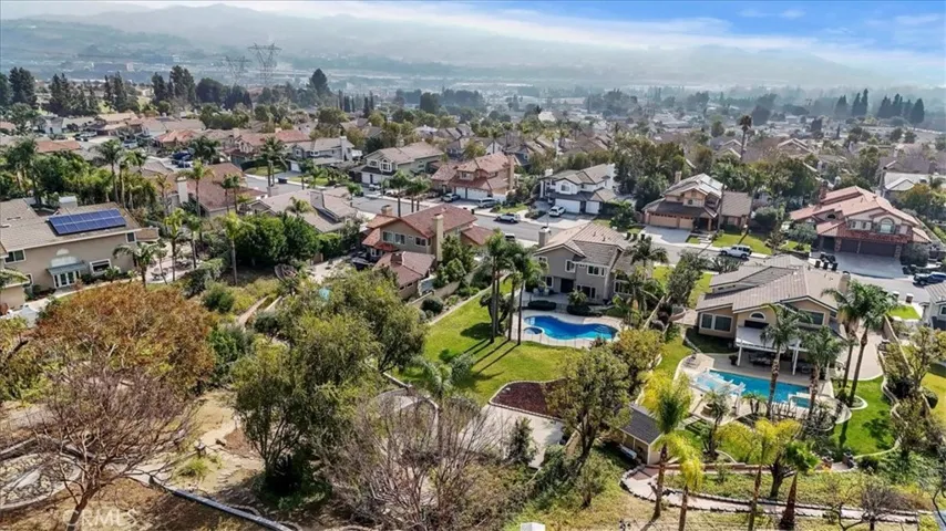 Views, views, views! There are orange, lemon, apple trees planted on the hillside. Plus a garden area for veggies or flowers.