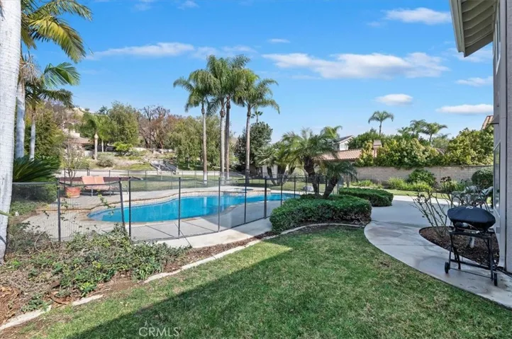 Another view of gated pool and spa (fence maybe removed)