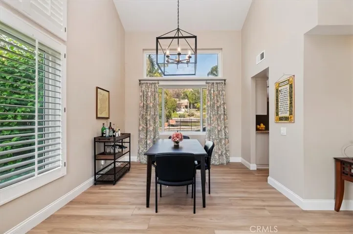 Entertain your family and friends in your formal dining room. Notice the large picture window which over looks a shade garden area and pool and spa