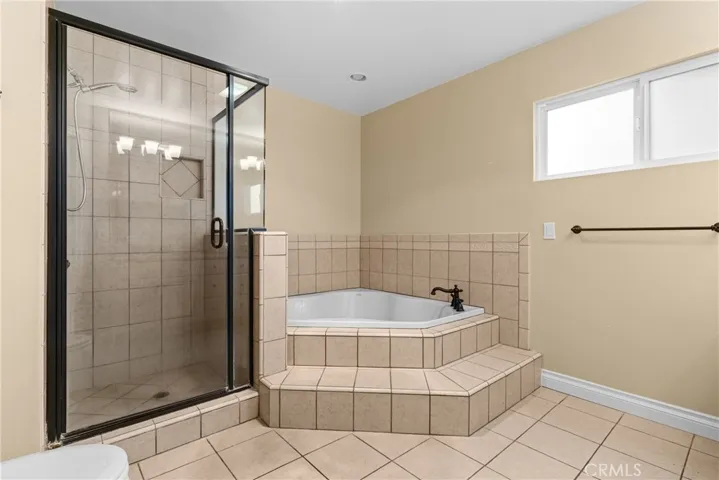 Primary bathroom with separate shower