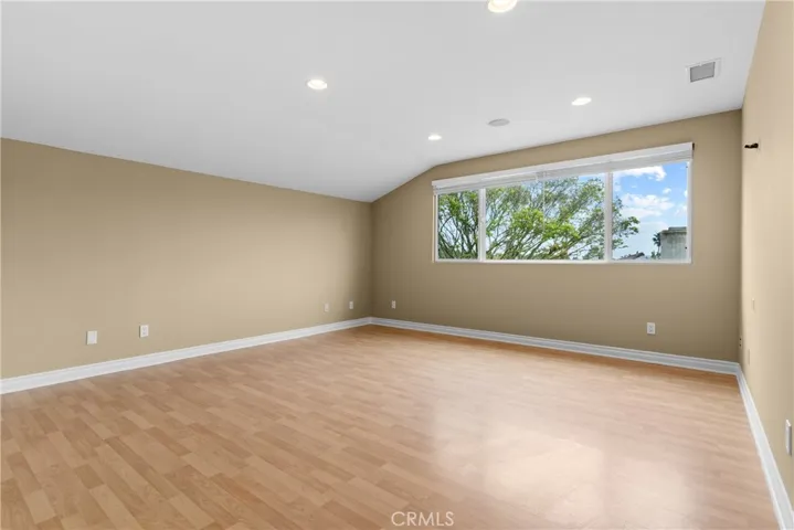 Primary bedroom with big window