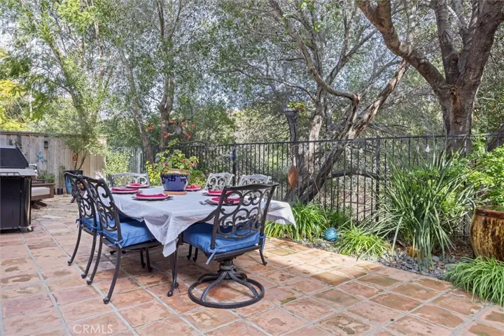 Peaceful privacy created by the downslope of the hill, the creek and then the walking paths on the other side.