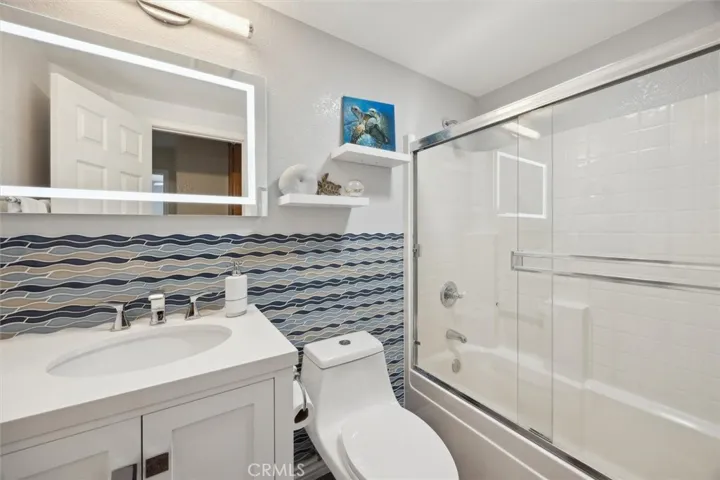 Fun waves of tile as the backsplash.