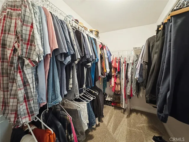 Generous primary bedroom closet.