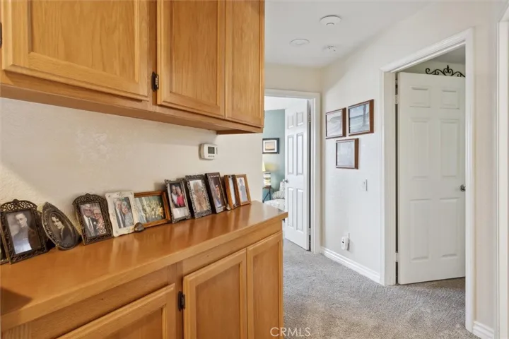 The hallway at the top of the stairs.
