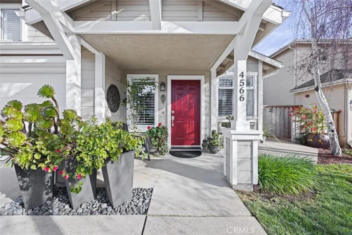 Accented by the red door, this entrance is lovely!