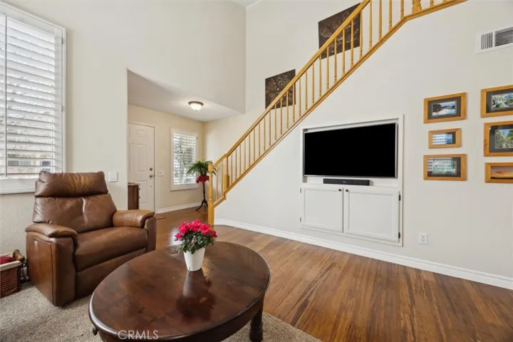 The built-in TV with sound system will stay with the home.
