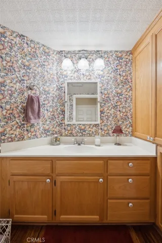 Powder room under the stairs.