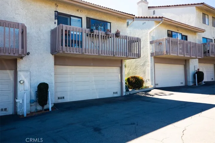 Back of unit with attached garage