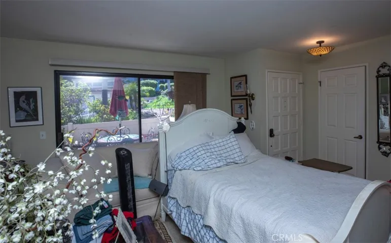 Living room currently used as a bedroom