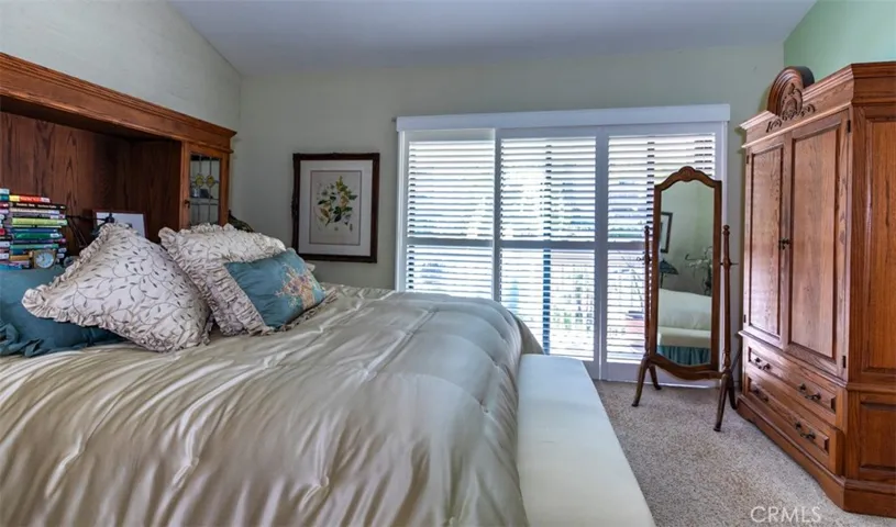 Sliding door to balcony with shutters