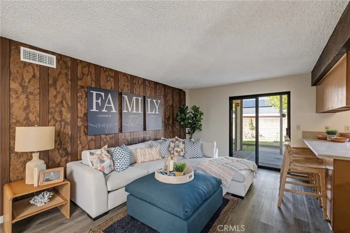 Family Room with sliding glass doors leading to the large backyard