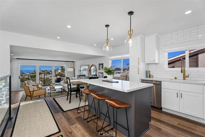 Kitchen island with breakfast bar.