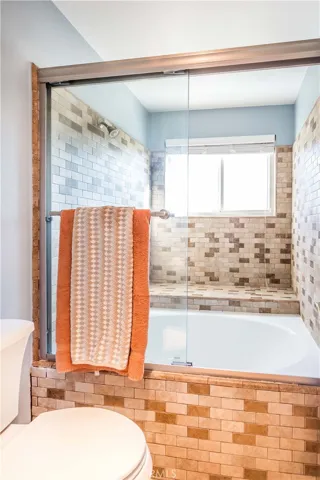 Primary suite walk in shower/ soaking tub