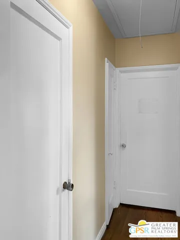 Main level bedroom hallway real wood flooring
