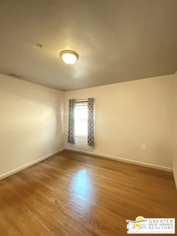 Bedroom Number 2 real wood floors