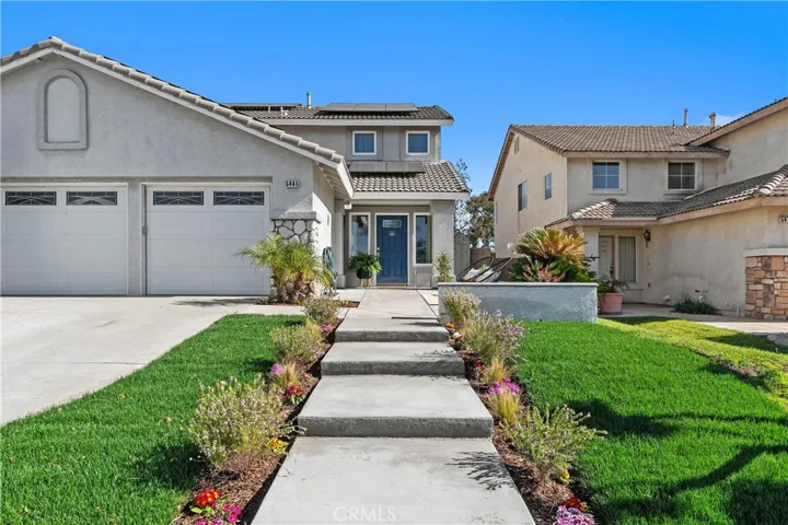 Beautiful Curb Appeal with New Sod, Sprinklers and Flowers