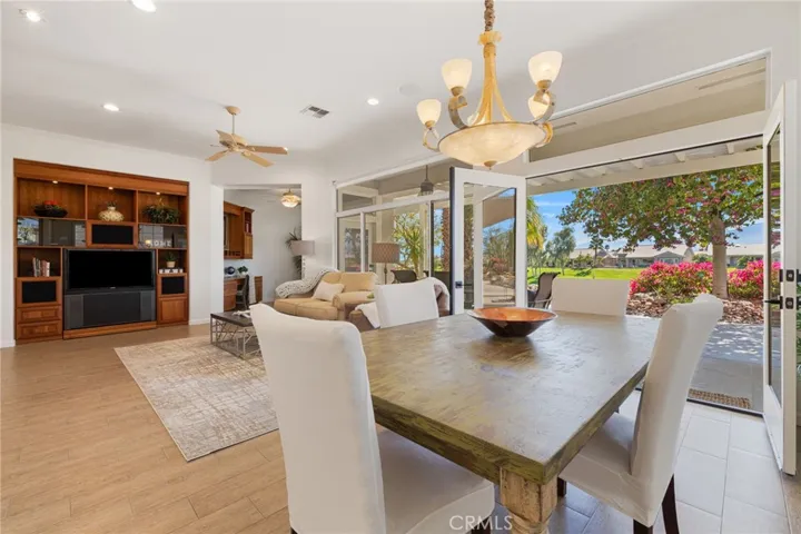 Great room open floor plan with double french doors.