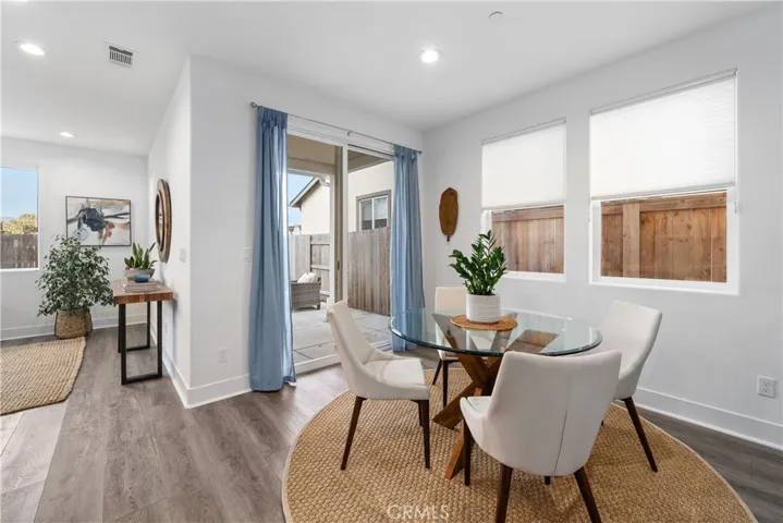 Dining room with slider to back.