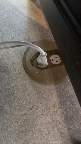 floor plugs in tile in livingroom