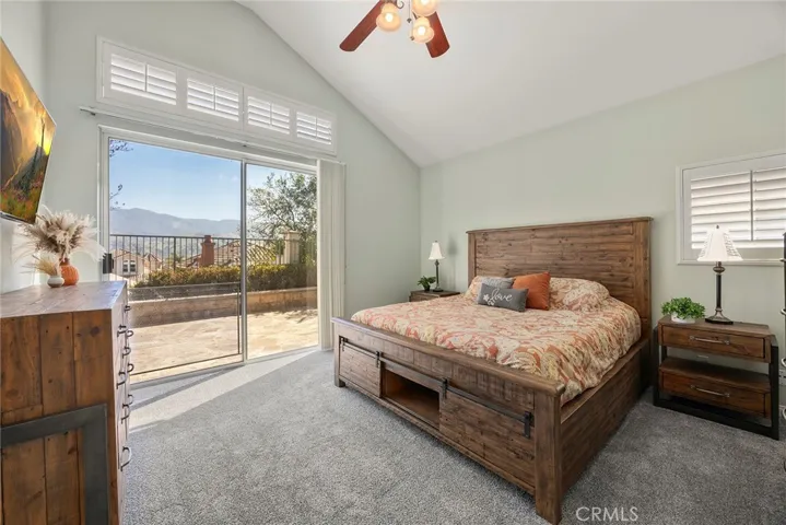 Primary retreat with sliding door access to backyard.