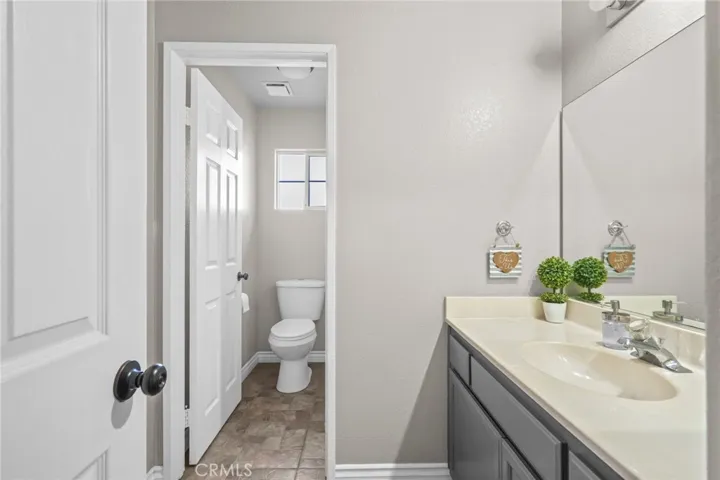 Upstairs Hallway: Bathroom 2 with vanity room adjacent to shower