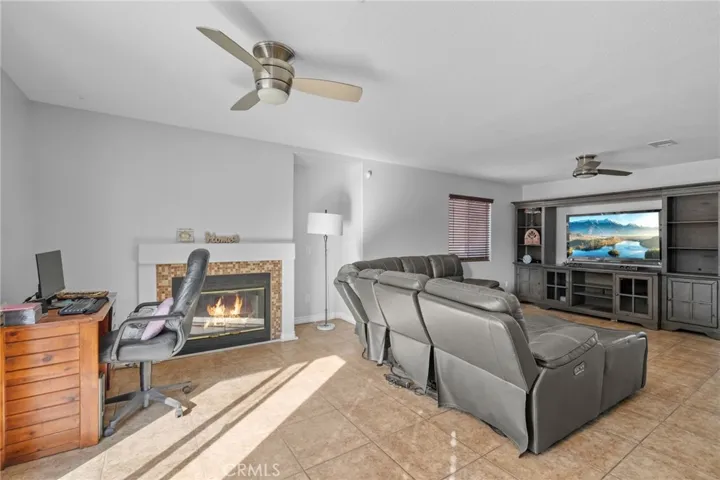 Downstairs:  2nd living room/Family room with a breakfast nook.  Can also be a formal dining room
