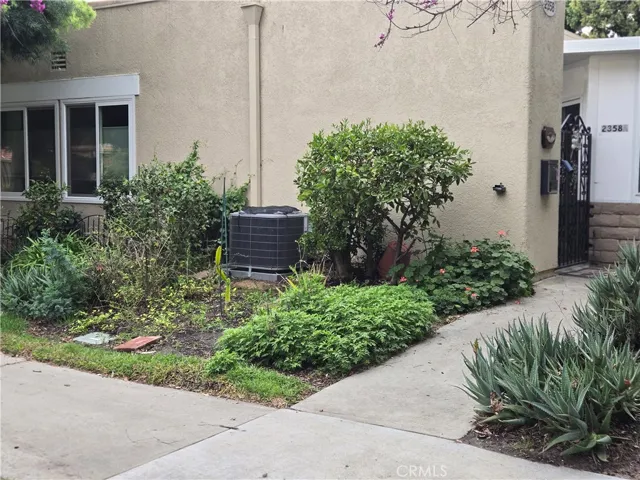 Front of home showing gardens
