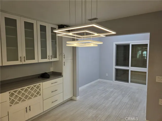 Completely enclosed atrium next to dining room...LOTS of options here