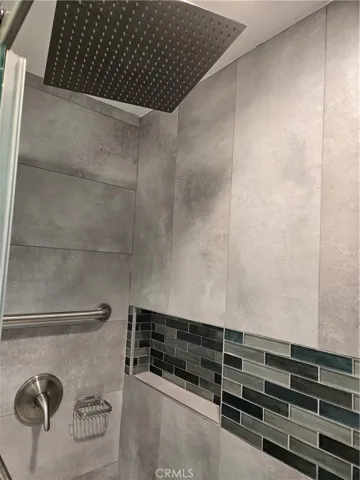 Guest bath shower w/custom tiled walls and "Rainfall" shower head