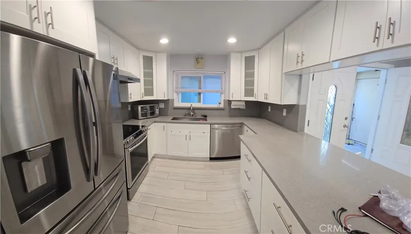 View from kitchen to dining area and living room